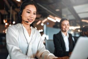 Team,Of,Successful,Call,Center,Employees,With,Headsets,Sitting,With