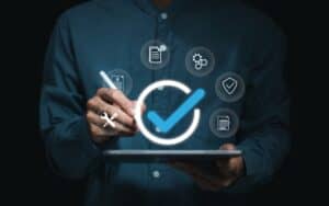 Businessman,Working,With,Guarantee,Check,Mark,For,Business,Automation,Process,