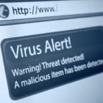 Closeup,Of,Virus,Alert,Sign,In,Internet,Browser,On,Lcd