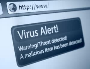 Closeup,Of,Virus,Alert,Sign,In,Internet,Browser,On,Lcd