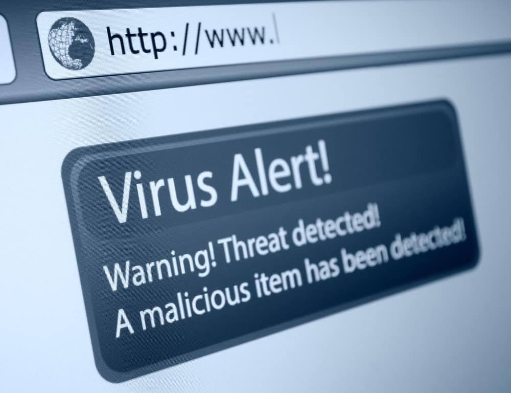 Closeup,Of,Virus,Alert,Sign,In,Internet,Browser,On,Lcd