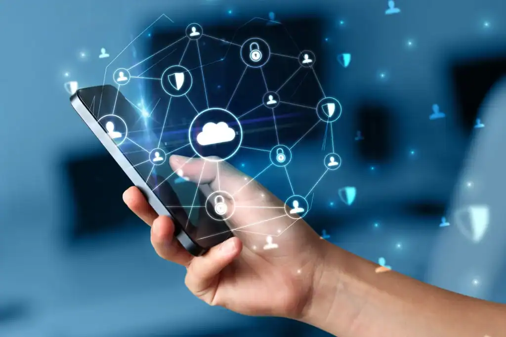 Secure cloud technology icons on smartphone representing IT services from CNiC Solutions.