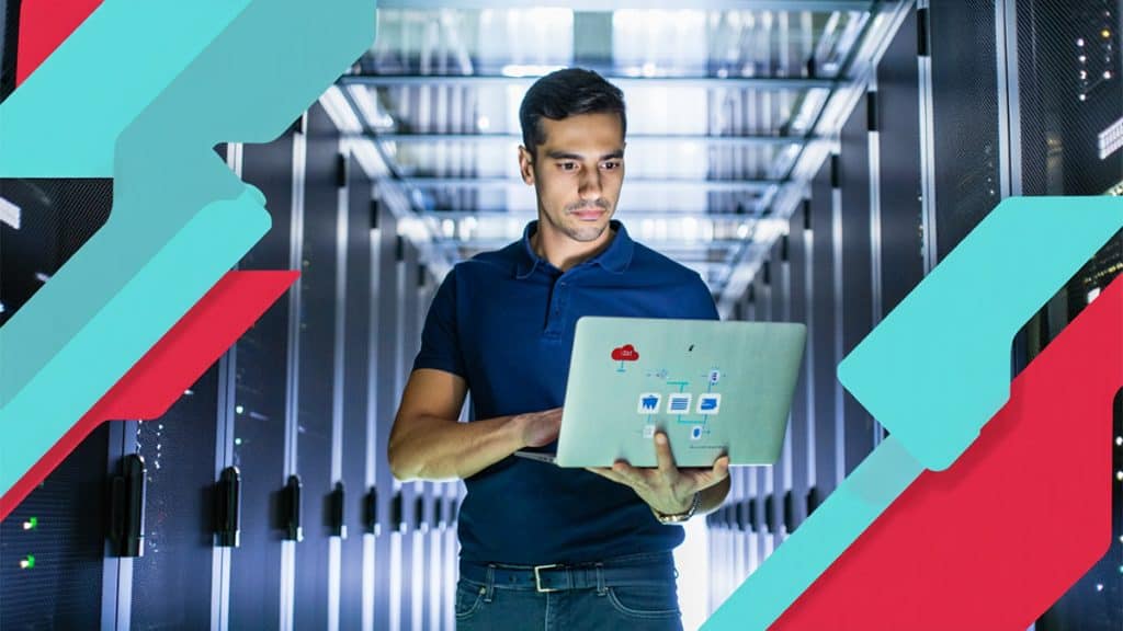 Cloud computing and network management expert working in a data center with servers.