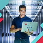 Cloud computing and network management expert working in a data center with servers.