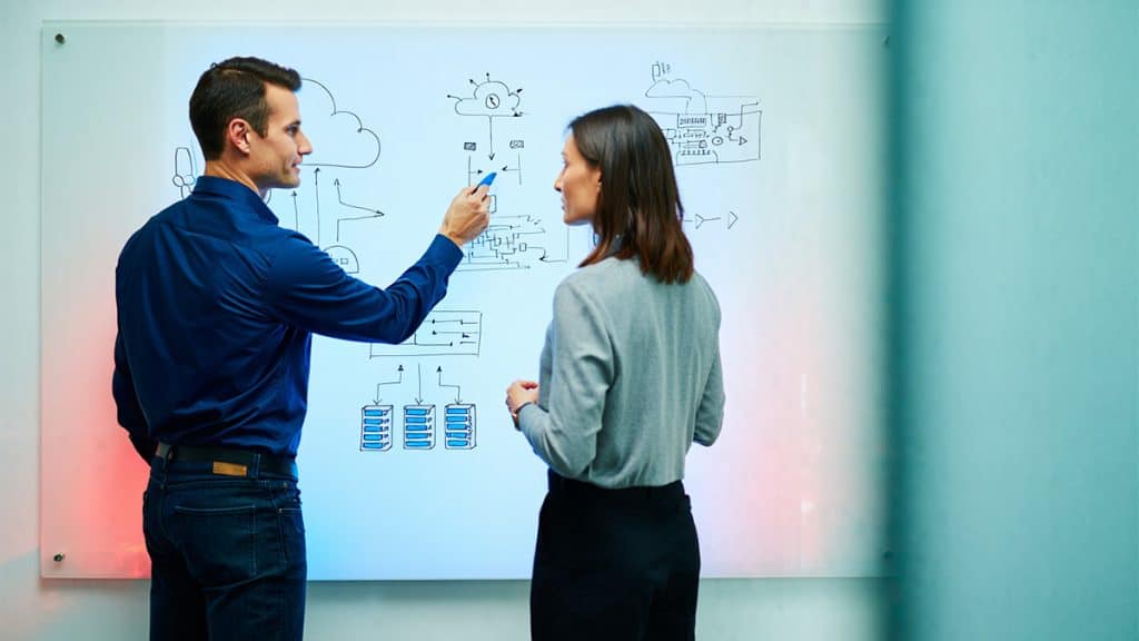 Innovative IT professionals collaborating on cloud infrastructure and data solutions at CNiC Solutions.