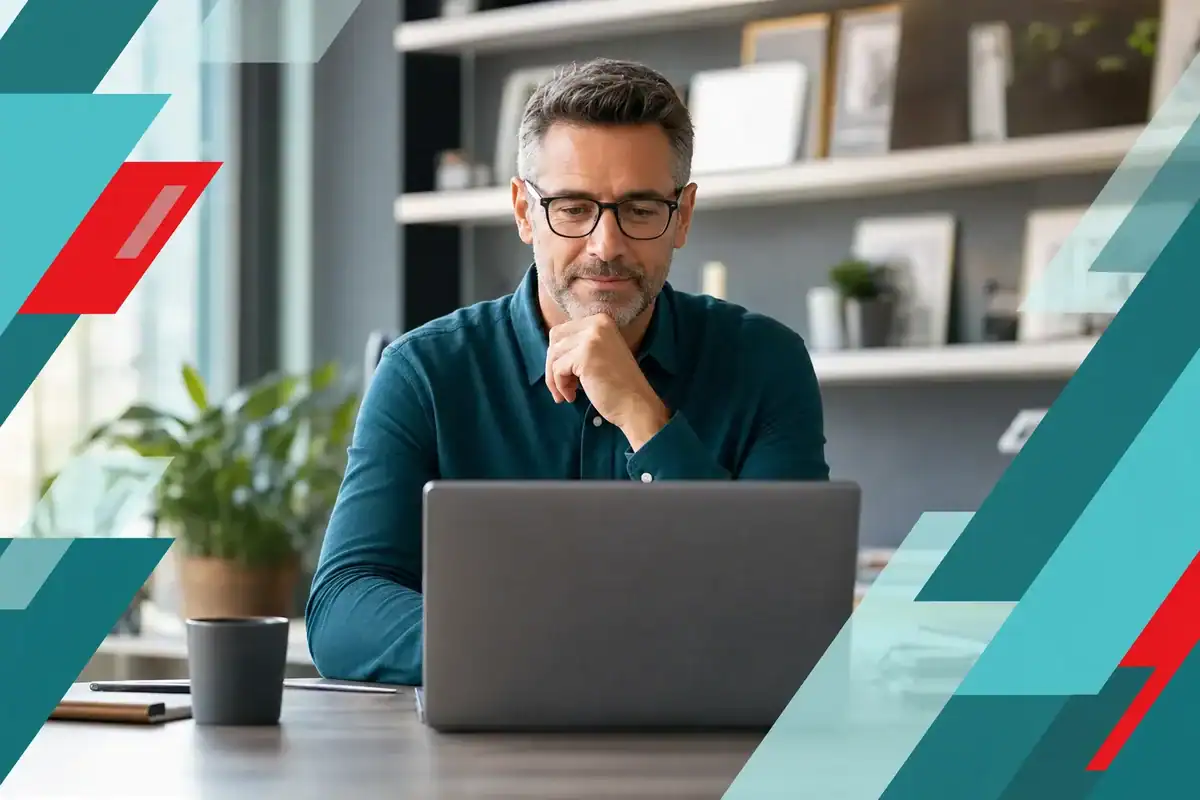 Business professional working on a laptop with IT infrastructure background in Houston.