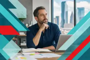 Business professional working on IT solutions in a modern office with city skyline view.