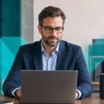 Business manager reviewing files with a multi-bay NAS storage device on the desk in a modern office