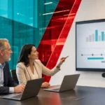 Business leader and technology advisor reviewing an IT strategy plan in a modern office